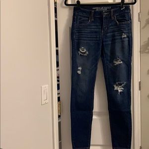 American eagle dark wash jeggins with rips